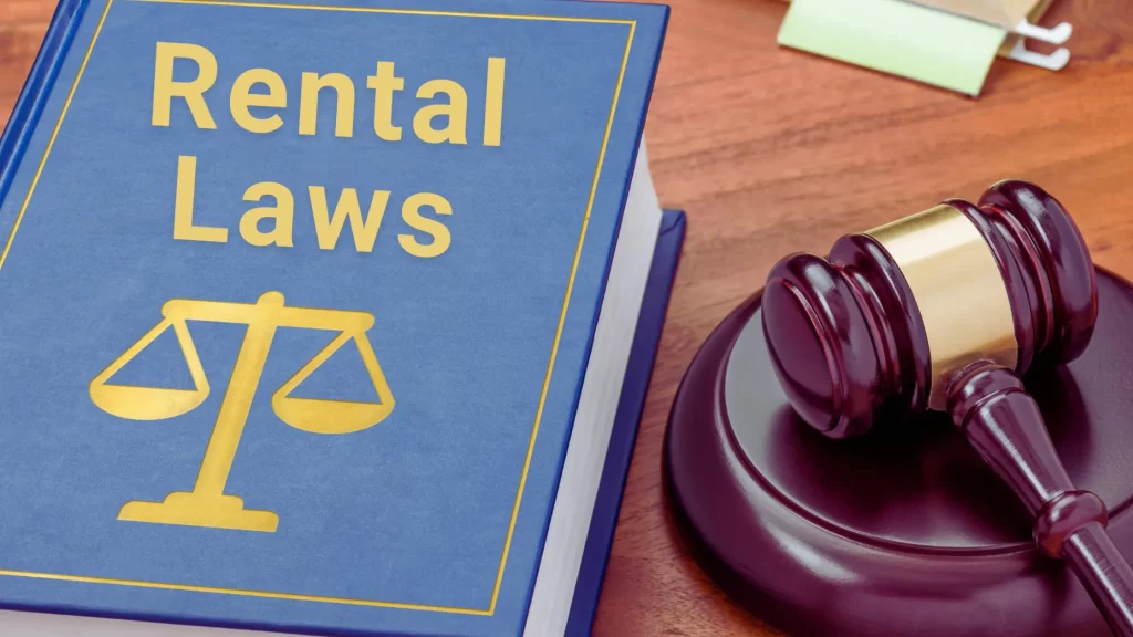 Rental laws book with a gavel representing legal compliance for Roseville short term rentals business license.